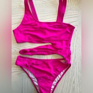 Gorgeous cut out hot pink one piece bathing suit